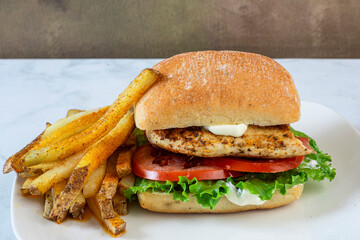 chicken sandwich  with seasoned  french fries