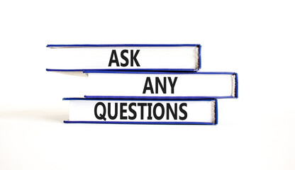 Ask any questions symbol. Concept words Ask any questions on beautiful blue white books. Beautiful white background. Business ask any questions concept. Copy space.