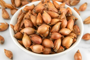 Closeup of Brown Shallot Bulbs in White Bowl