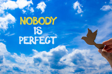 Nobody is perfect symbol. Concept words Nobody is perfect. Beautiful blue sky clouds background....