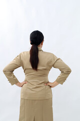 Back view of asian civil servant woman with hand on her waist, isolated on white backgroundvie