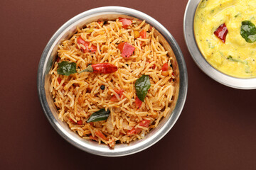 Tomato rice with mor kolumbu or kaddhi © surbhis