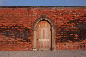 Old brick wall and door