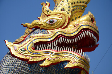 Sculpture ancient naga or carving antique naka statue for thai people travelers travel visit and...