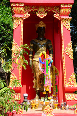 Ancient Mangrai King of Lanna Kingdom statue or antique Mengrai King monument for thai people traveler travel visit respect blessing at Wat Phra Kaew or Pa Ya or Pa Yiea temple in Chiang Rai, Thailand