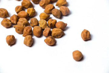 Organic Brown Chickpeas Isolated on a white background. Black chickpeas, also known as kala chana, Bengal gram,Egyptian pea.