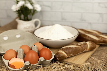 Freshly baked bread, flour, eggs. The process of baking bread.Baking Ingredients
