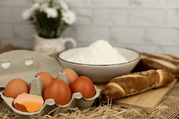 Freshly baked bread, flour, eggs. The process of baking bread.Baking Ingredients