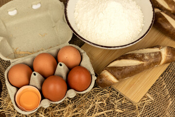 Freshly baked bread, flour, eggs. The process of baking bread.Baking Ingredients