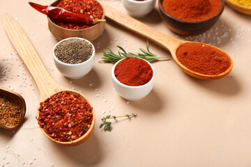 Composition with different aromatic spices and herbs on color background