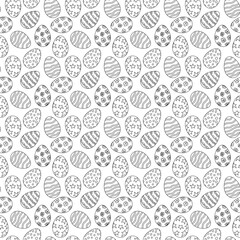 Seamless pattern with decorative Easter eggs featuring doodle designs like stars, flowers, dots, and waves. Black and white outline for coloring page and prints.