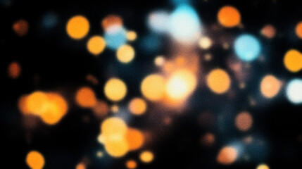 Obraz premium Grain noise texture Bokeh Soft, blurry lights in warm orange and cool blue on a black backdrop