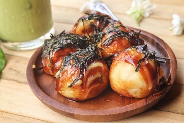 Takoyak balls snack and iced green tree  Japanese street food