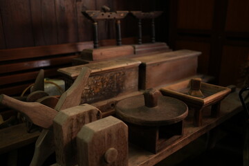 Industrial Warehouse with Stacked Wooden Planks, Pile of Rough Hardwood Timber Boards in Brown, Featuring Natural Patterns Texture, Ready for Construction and Material Storage Factory