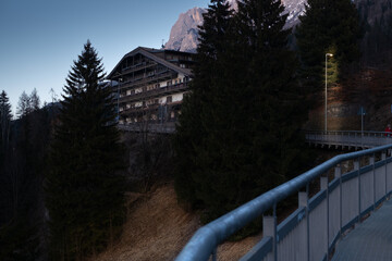 Mountain road with hotels. Moena area, Italy