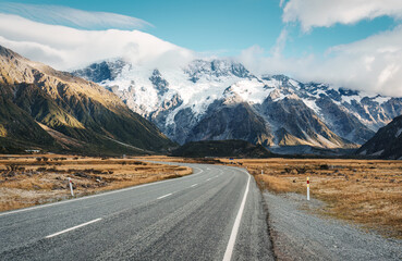 Road trip on the road heading to Mount Cook among autumn wilderness at New Zealand