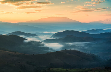 Golden sunrise shining over Doi Inthanon and foggy mountain on harvest season