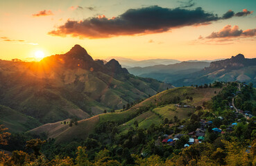 Rural landscape of sunset over rolling mountain with local village in the valley at Gigokor viewpoint