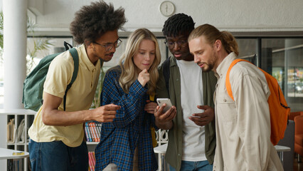 Four multiracial friends multiethnic diversity students African American men male guys Caucasian...