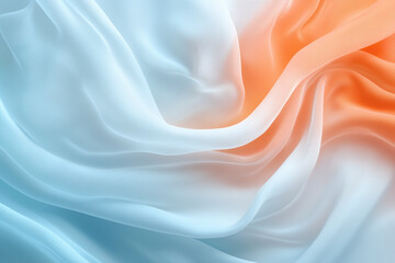 Fototapeta premium Swirling fabrics create a soothing abstract design with contrasting hues of blue and orange, airy and light.