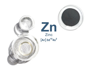 Close up chemical ingredient on white laboratory table. Zinc Powder in Chemical Watch Glass with Symbol, Name and Electron Configuration.
