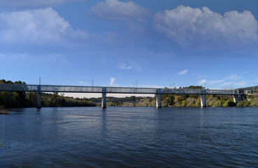 Fototapeta premium International road and rail metal bridge over the Minho River on the northern border of Portugal between the cities of Valença and Tui, Portugal, Spain, Europe
