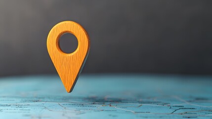 Close up of an orange map pin icon against a dark textured blue background representing the concept of digital navigation and location tracking