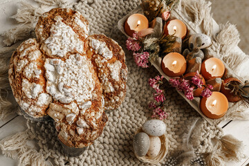 Colomba - Italian traditional Easter bread is topped with pearl sugar and almonds in the shape of a dove. Festive pastries are traditional in Italy.
