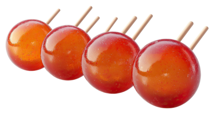 Caramel Apples: A close-up shot features a row of glistening caramel apples on wooden skewers, the vibrant red and golden hues of the candies and the textural appeal of the wood and sweet.