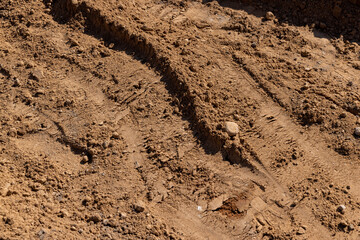 hole in the ground on the site of which a highway was started