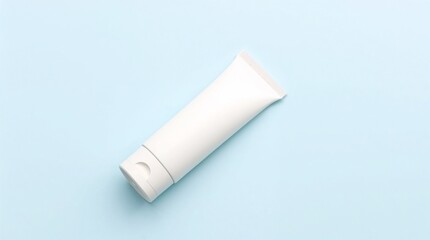 Empty white tube mockup lying down. Cream packaging design mockup with space for text.