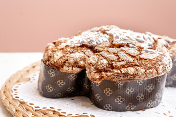 Colomba - Italian traditional Easter bread is topped with pearl sugar and almonds in the shape of a dove. Festive pastries are traditional in Italy.