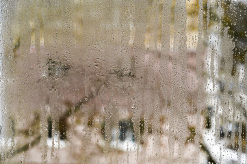 drops of water on wet glass. background