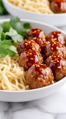 Fototapeta premium Delicious Sesame Glazed Meatballs Noodles Bowl