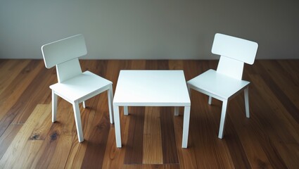 White small table furniture and two chairs situated across on a wooden surface.