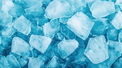 Obraz premium Blue ice cubes arranged in a textured pattern.