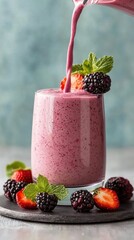 Berry smoothie being poured (1)