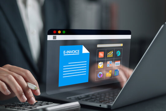 E-invoice and online digital statements concept. Businessman working with digital invoice management system on laptop.