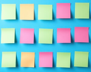 A vibrant arrangement of colorful sticky notes on a blue background, offering a creative space for reminders and ideas.