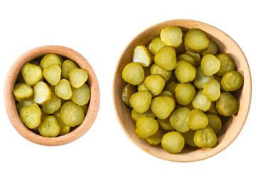 chopped pickled cucumbers in a wooden bowl isolated on a white background, top view.