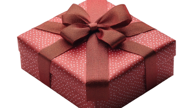 Gift's Wrapped in Elegance: An eye-level shot of a beautifully wrapped gift, its polka-dotted, red wrapping paper is adorned with a stylish bow. The image exudes anticipation and warmth.