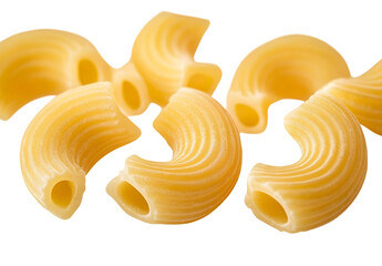 Close-up of individual pieces dry elbow macaroni pasta isolated on transparent background