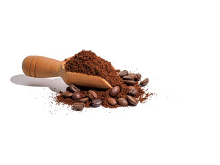 Ground coffee in wooden spoon.