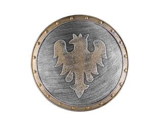 Old decorated metal round shield with eagle isolated on white background with clipping path