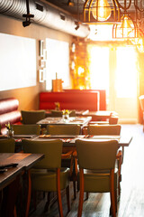 Natural restaurant interior with scenic view at sunset