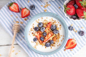 Sweet Homemade Breakfast, Greek Yogurt bowl with Granola and Berries