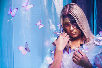 An Artistic Portrait Featuring Beautiful Butterflies and Distinctive, Unique Makeup Designs