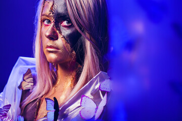 An Artistic Portrait Featuring Beautiful Butterflies and Distinctive, Unique Makeup Designs