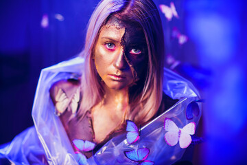 An Artistic Portrait Featuring Beautiful Butterflies and Distinctive, Unique Makeup Designs