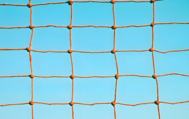 Fototapeta premium Abstract Netting Texture Against Blue Sky Background